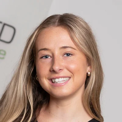 A headshot photo of Taylor Fox, the social media marketing coordinator at Fox Integrated Healthcare